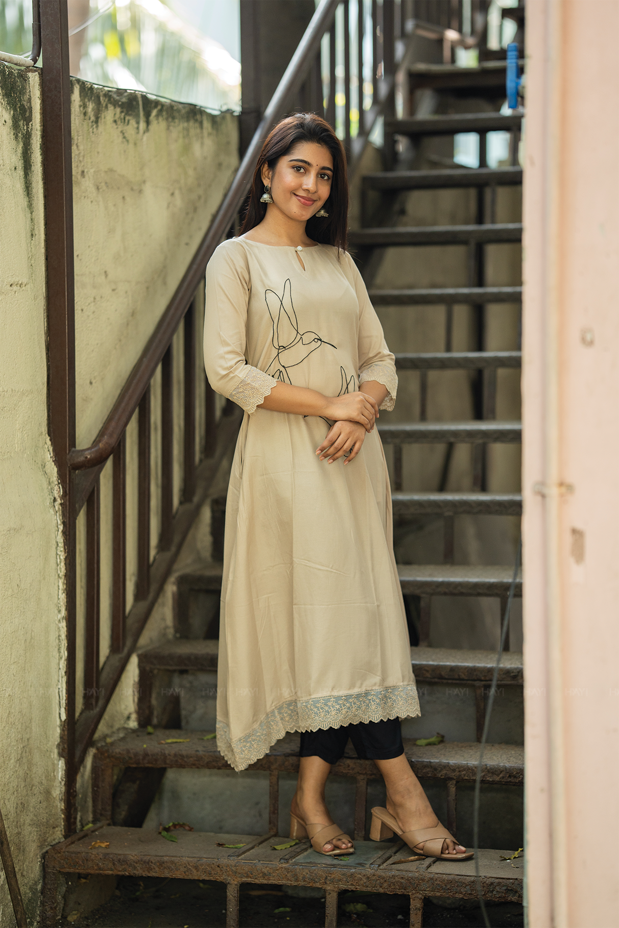 Nira Feather Beige Viscose Embroidered A-Line Kurta with Boat Neck and 3/4 Sleeves